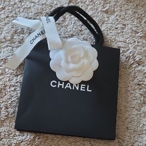 Chanel Black Bag with White Floral Detail